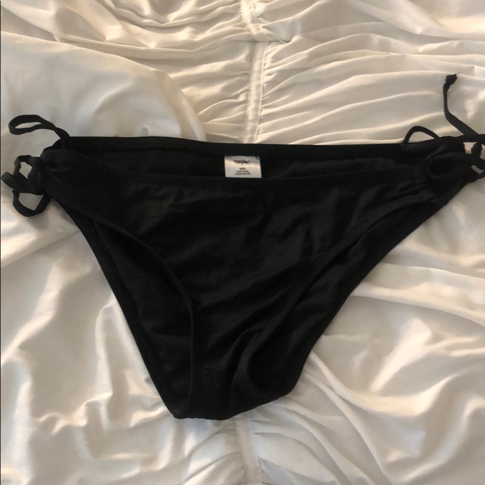 Black target bathing suit bottoms